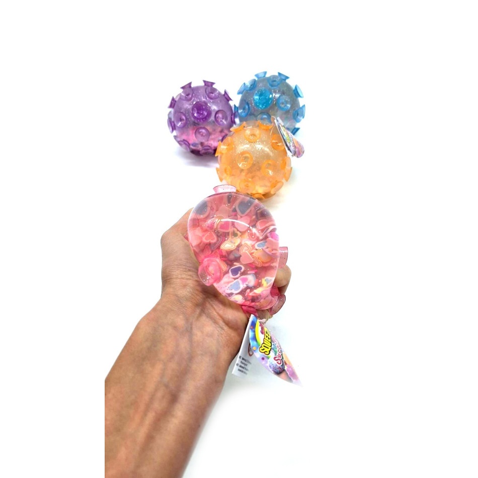 Brokatowy gniotek piłka przyssawka z konfetti