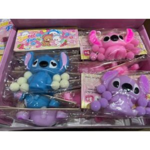 Gniotek stitch z pomponami